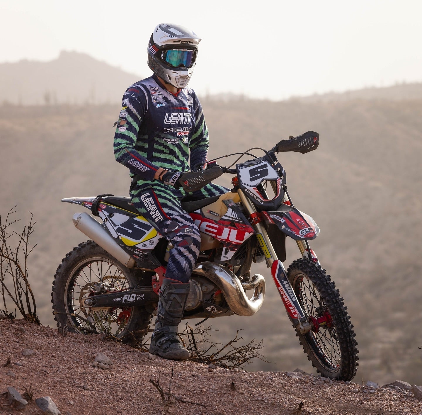 Quinn Wentzel sitting on bike in full Leatt kit